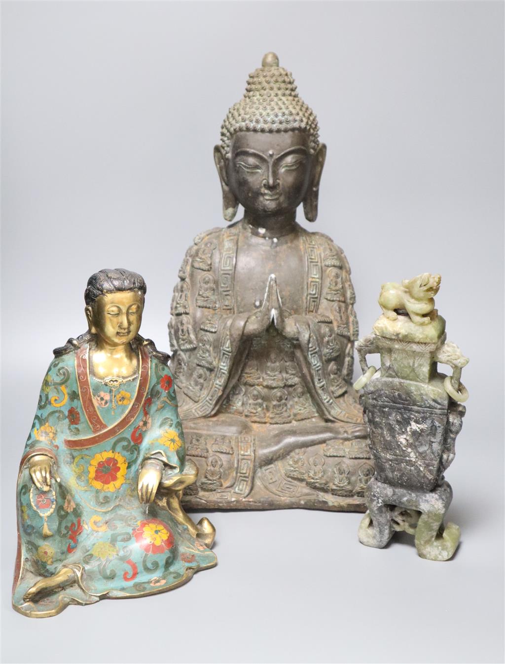 A large bronze Buddha, a Chinese cloisonne enamel figure and a hardstone vase and cover, tallest being 43cm high